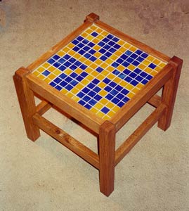 Mosaic stool with squares of glass